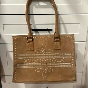Boot stitch suede bag